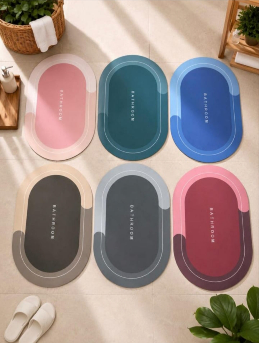 Oval bathroom mats shown in six colour designs