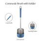 Blue commode brush with long handle and matching holder